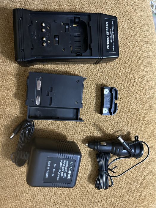 Универсальное зарядное , подходит под 15 фирм