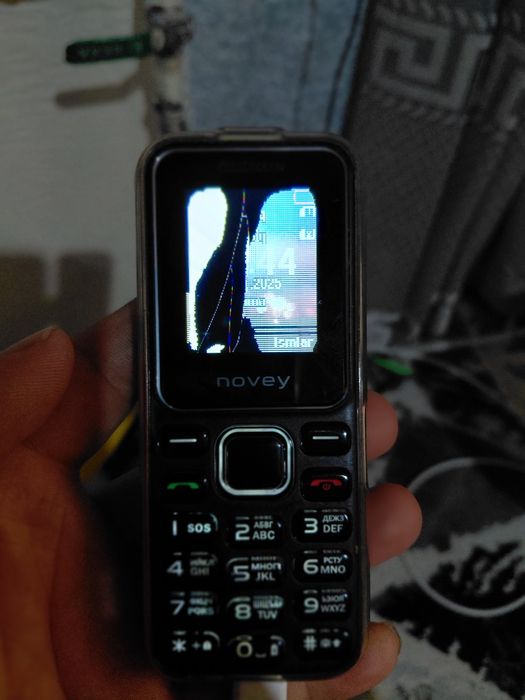 Novey knopkali telefon