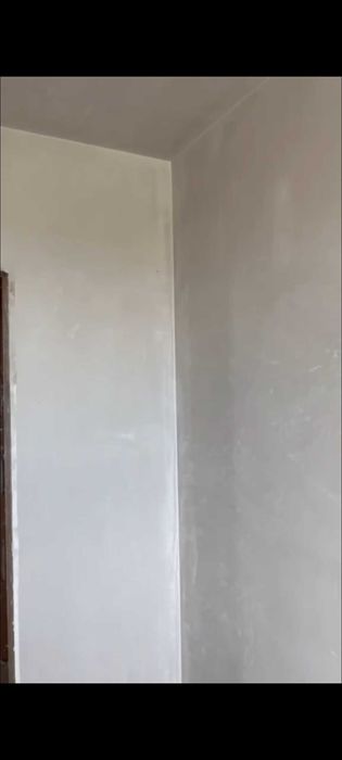 Машинна мазилка, шпакловка-боя.