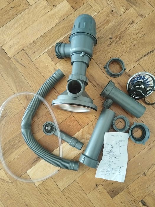 Нов сифон за мивка и капак за камина комин