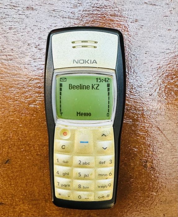 Nokia 1100 зарядным устройством