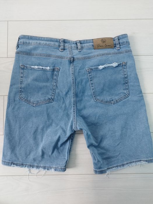 Мъжки дънки с накъсан ефект