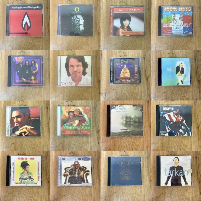 CD дисков  AC/DC, Pink Floyd, Mariah Carey, Bryan Adams и другие
