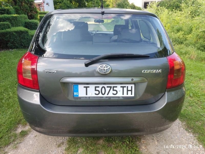 Тойота Corolla 2003