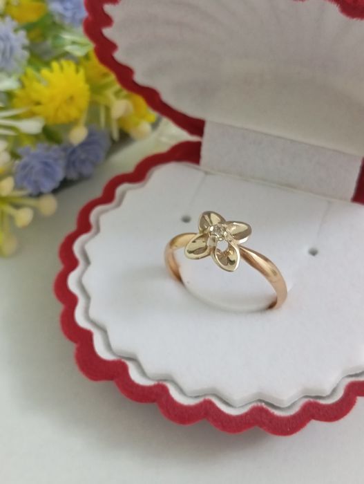 Tilla uzuk 585 proba 100$ yengi