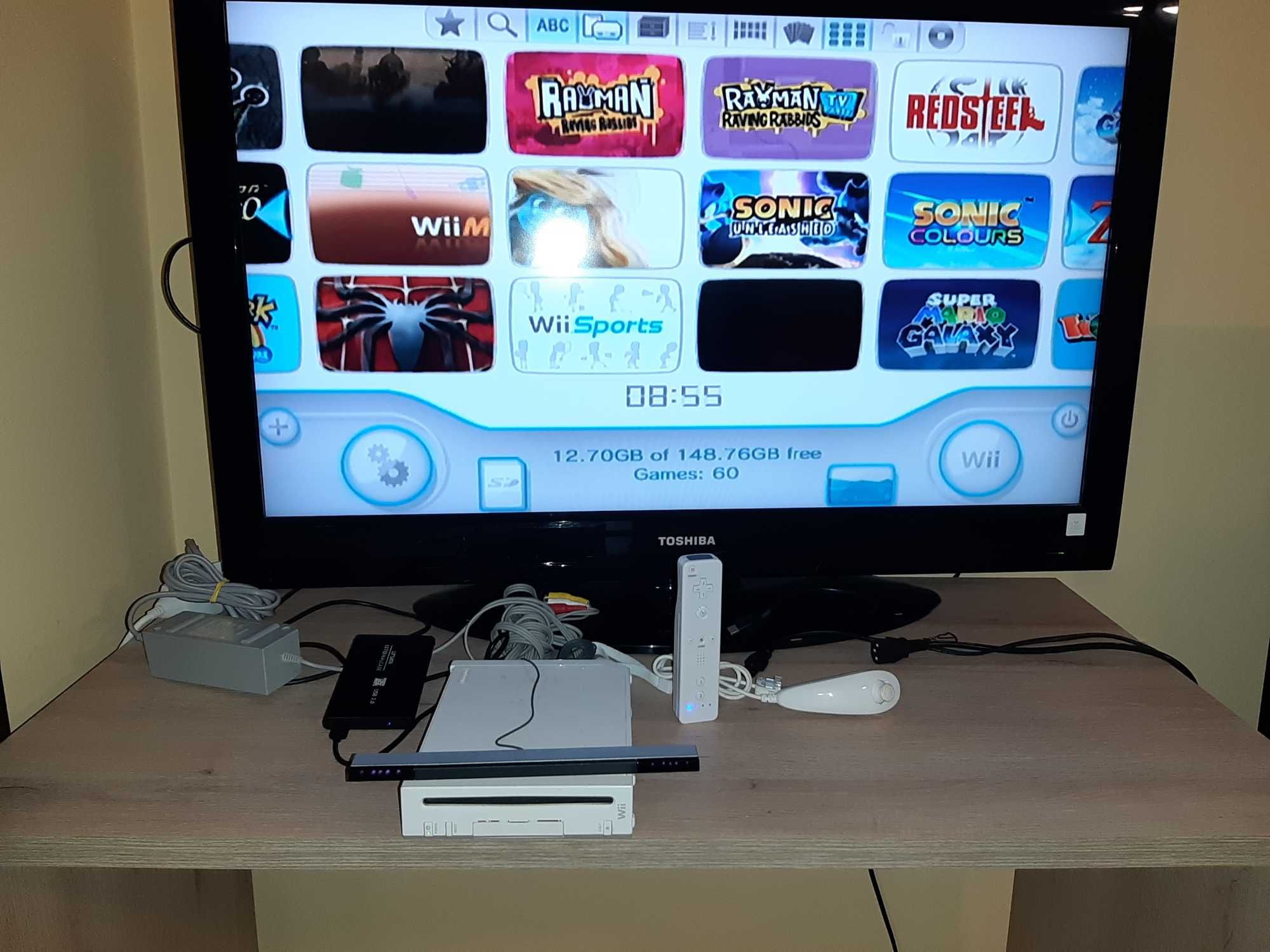 Нинтендо Nintendo Wii комплект цената е за всичко 89 игри на хард диск