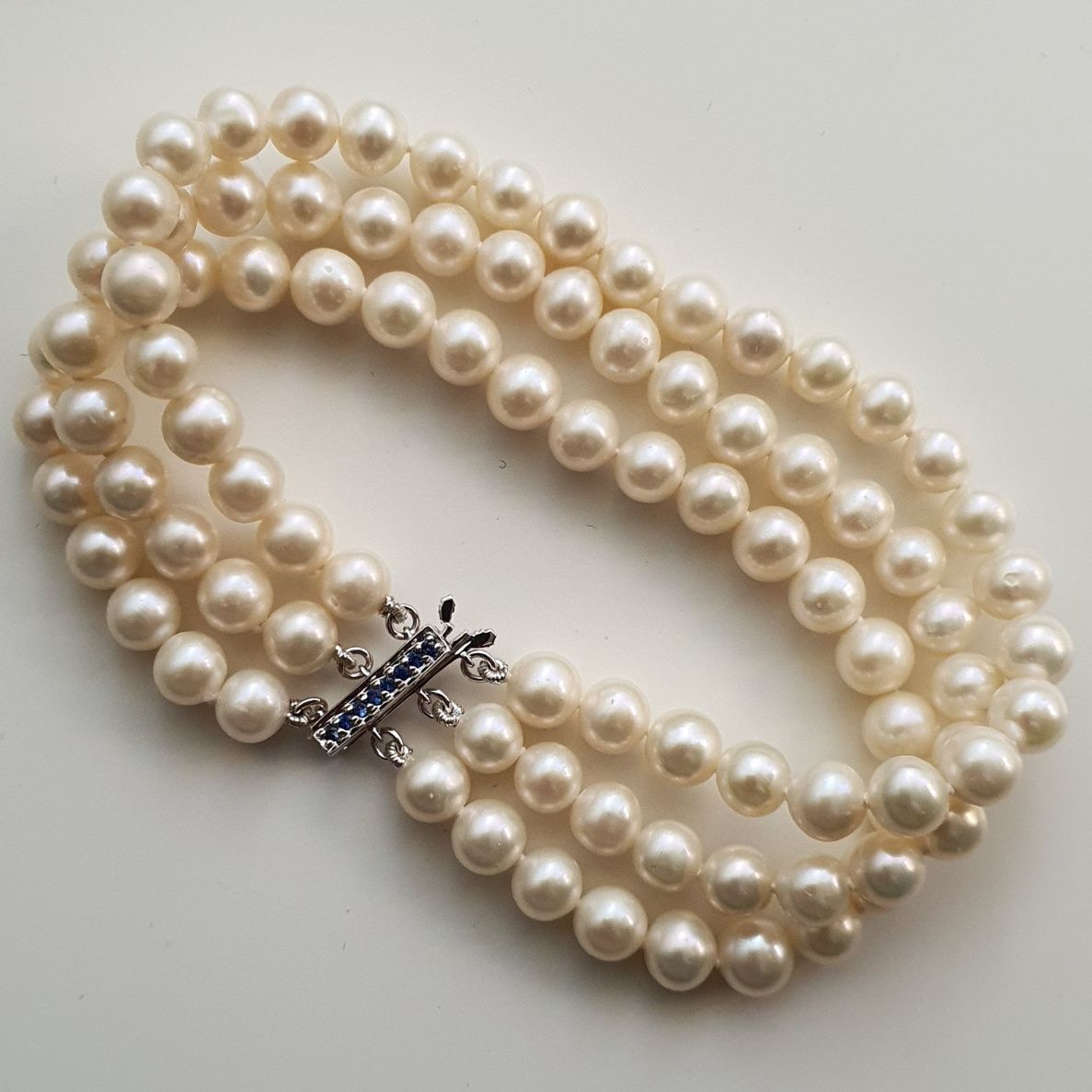 splendida bratara tripla perle naturale inchizat aur alb 14k cu safire