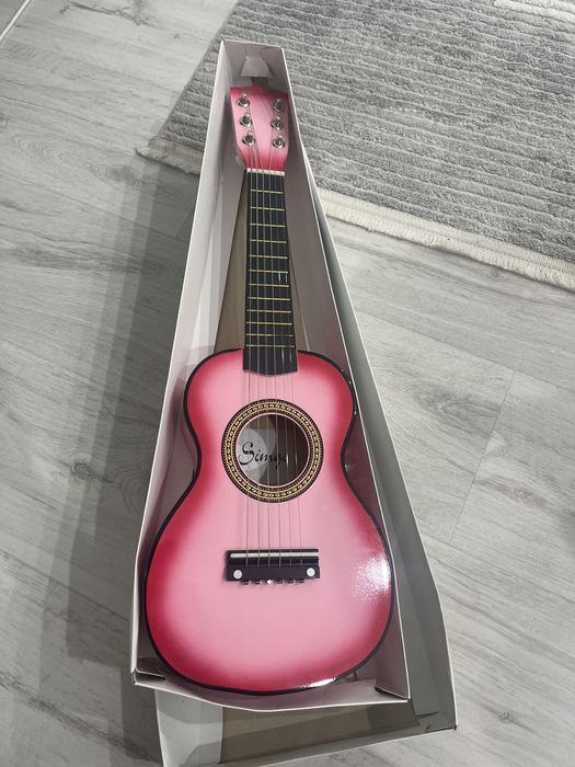 Продам укулеле почти новая