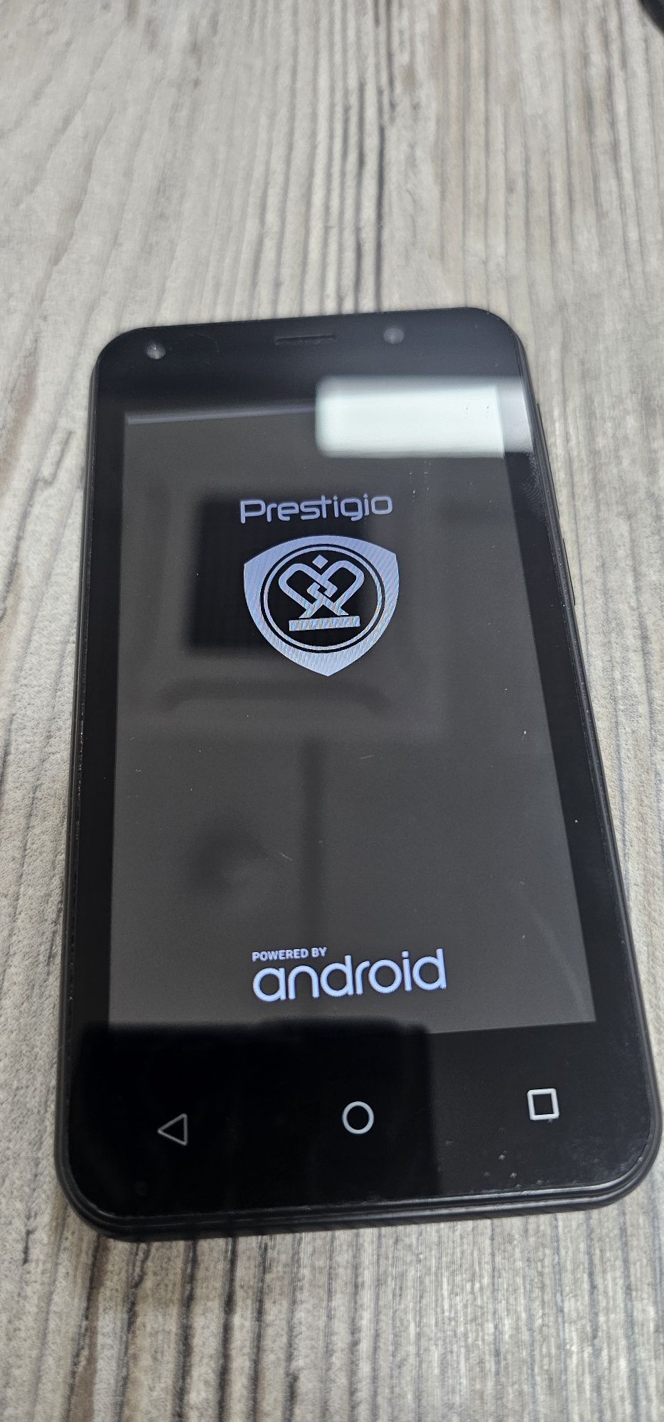 Смартфон Prestigio Wize L3.