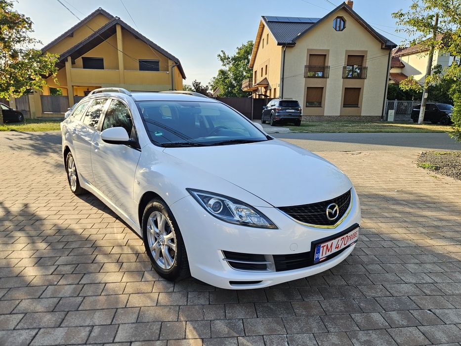Mazda 6 an 2010 clima