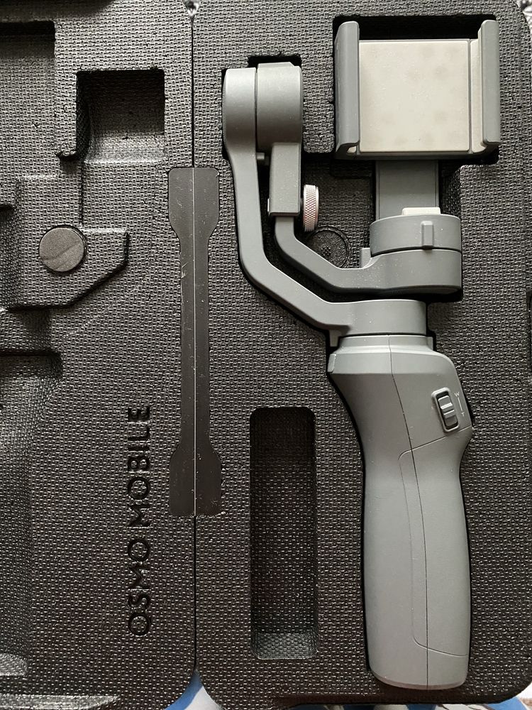 Dji osmo mobile 2 (nu mai tine acumulatorul)