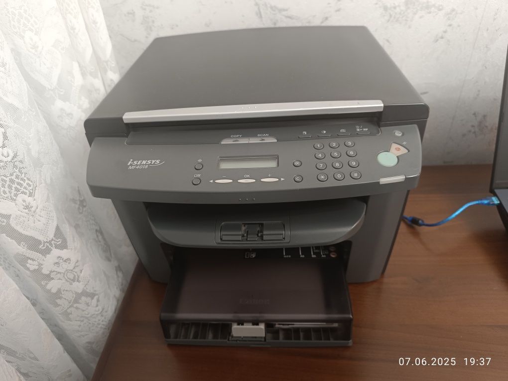 Лазерное МФУ Canon MF4018