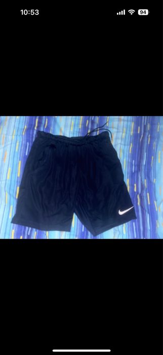 Doua perechi de pantaloni nike