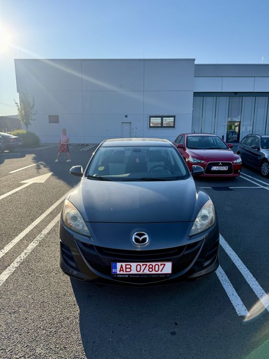 Mazda 3 2009 105cp