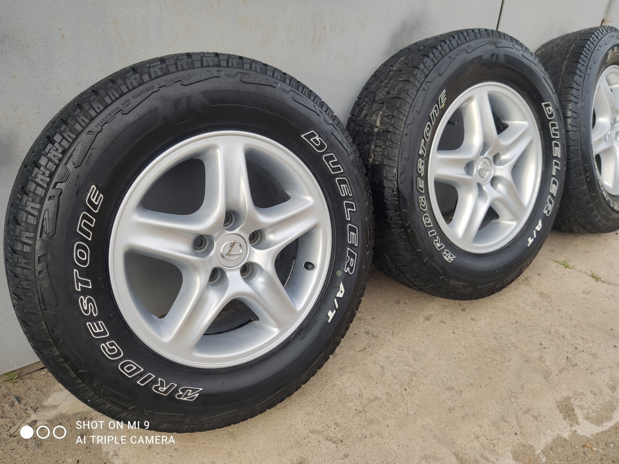 Продам комплект колес с резиной Bridgestone AT 001 225/70/r16