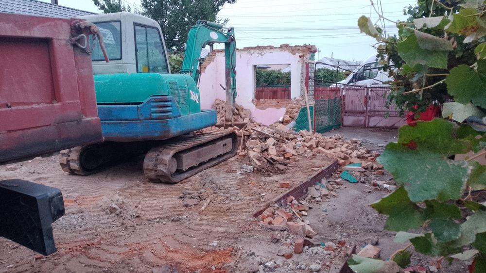 Evacuez Transport Excavator Buldoexcavator De Închiriat