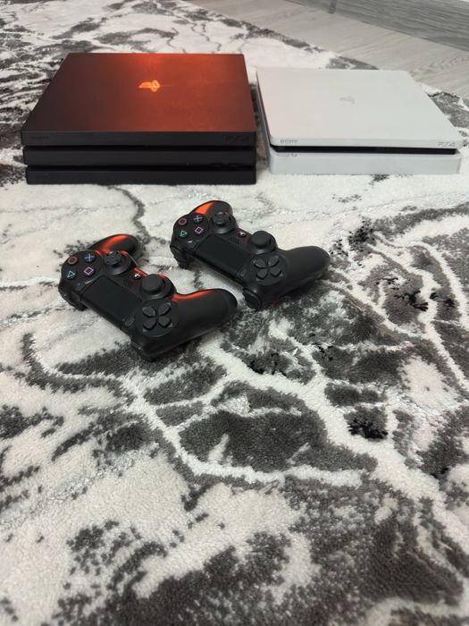 Plastation 4pro  в черном цвете 1тб  2игр 2 джостик и провода