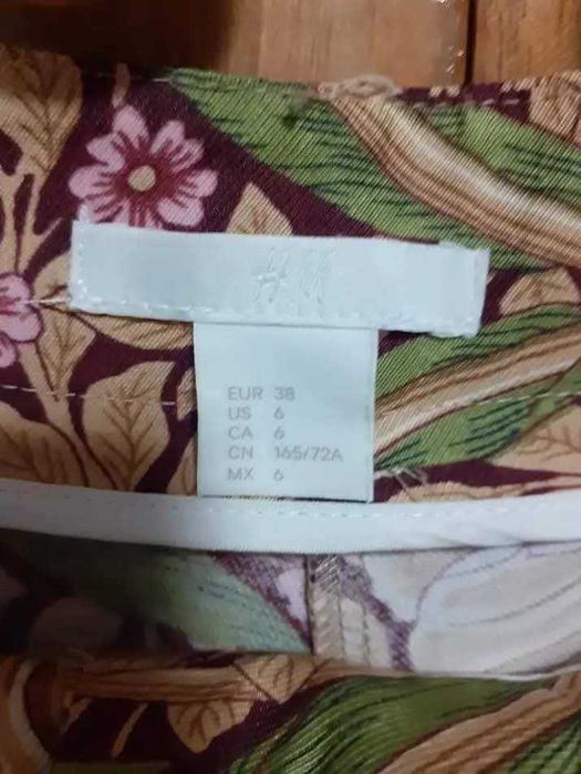 Pantaloni H&M de vară largi fond verde cu imprimeu floral mărimea M-L