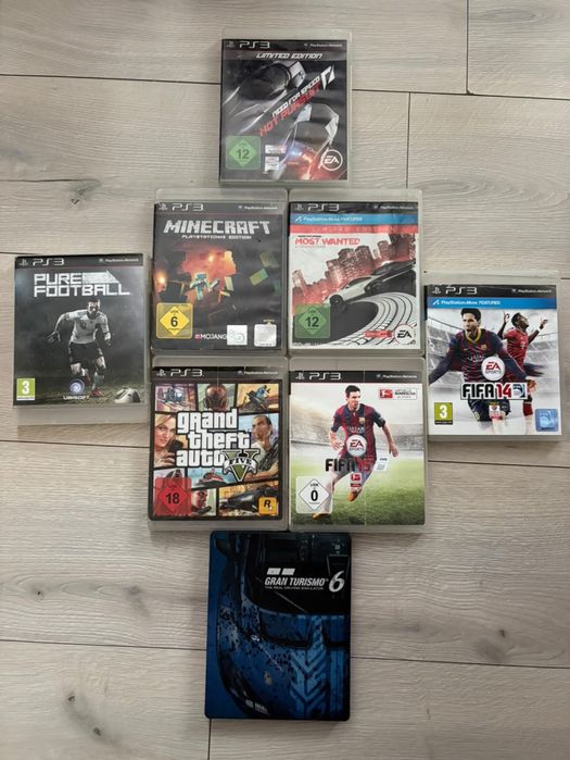 2 manete PS3 originale + 8 jocuri populare, totul funcțional