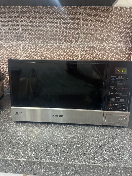 Продам 20000 тг микроволновую печь в отличном сост