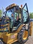Buldoexcavator Caterpillar