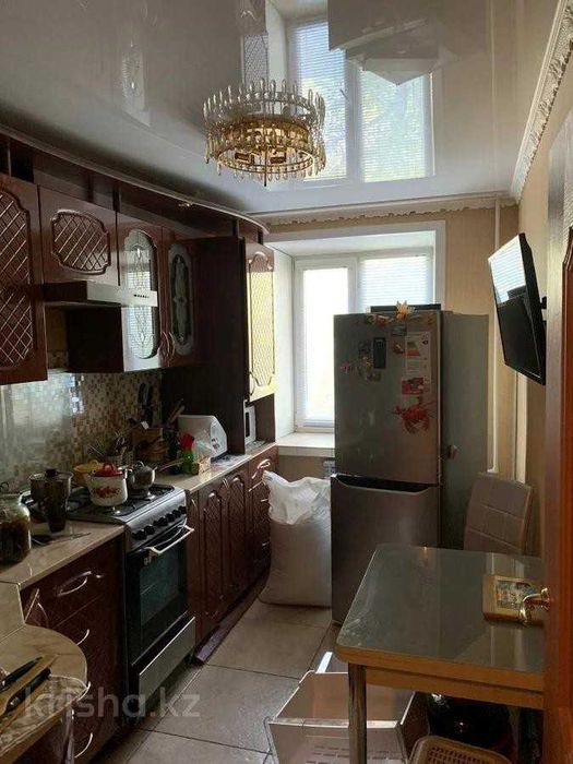 Продажа 4-комнатной квартиры амангельды центр 2 этаж за 26млн