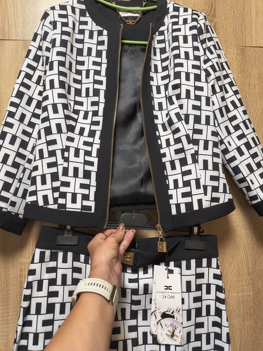 Елегантен дамски костюм