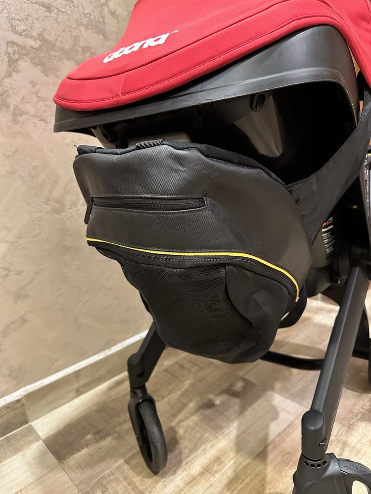 Doona столче за кола с шаси 2 в 1 flame red