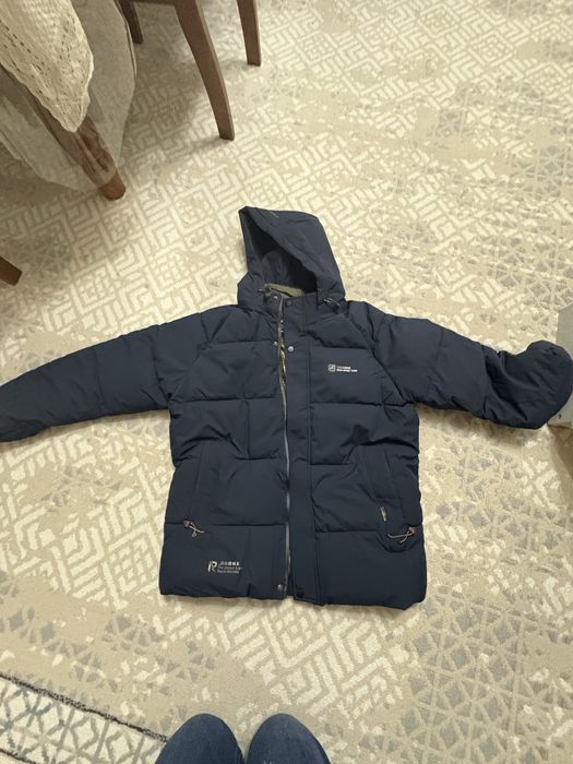 Продам новую мужскую куртку