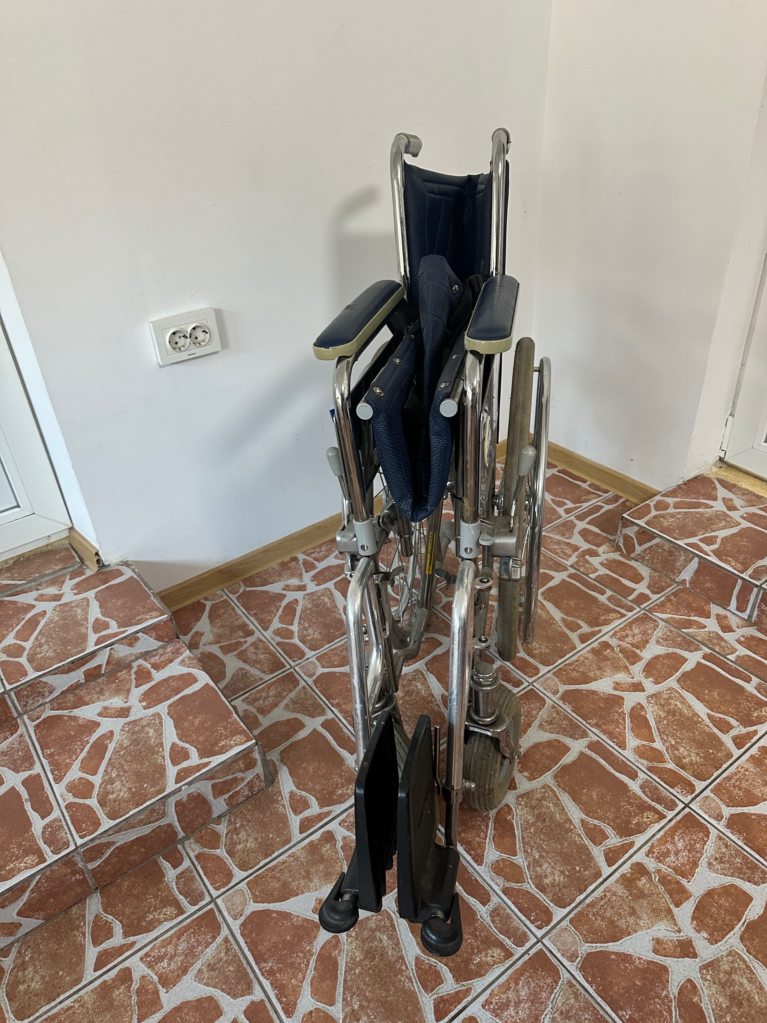 Carucior transport persoane cu dizabilitati