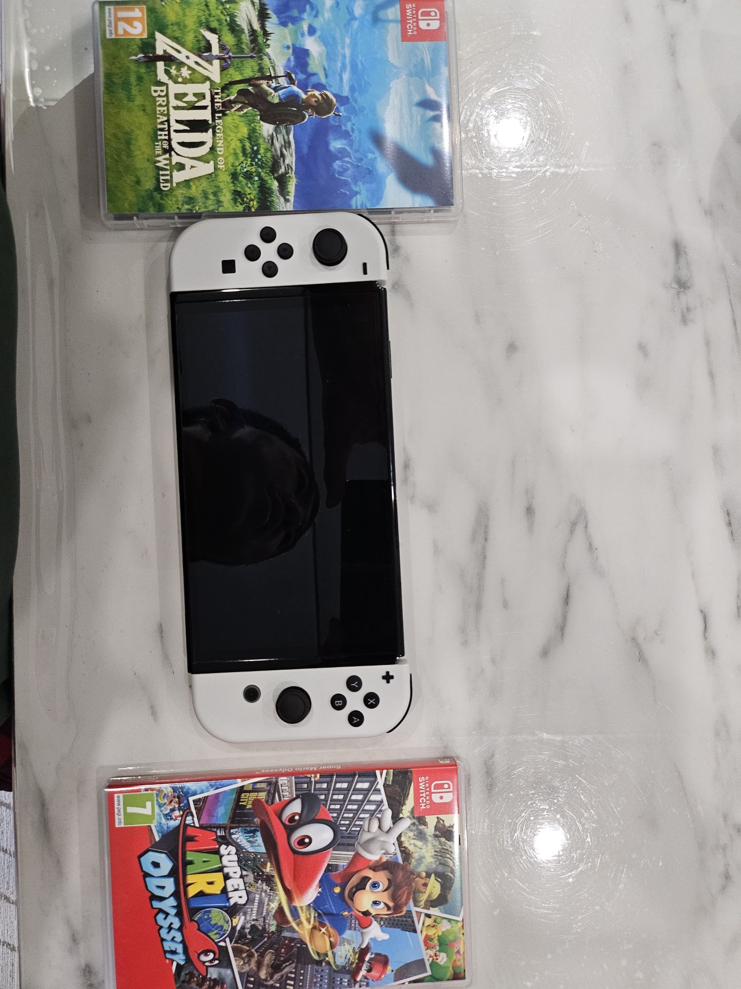 Nintendo switch OLED новый с играми