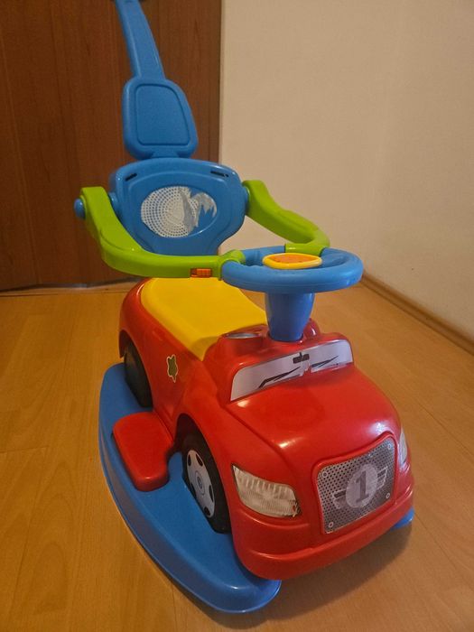 Masinuta Ride-On 4 in 1 Dolu Step Car Rosu pentru copii intre 1-3 ani