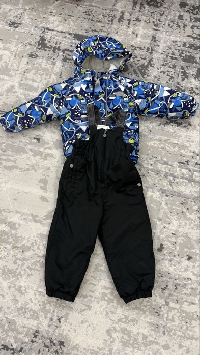 Продам зимний комбинезон Reike