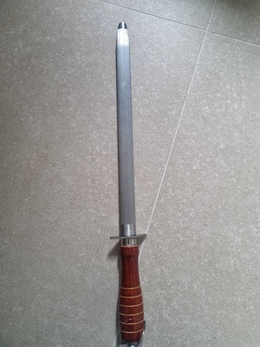 Masat oval cu mâner de lemn