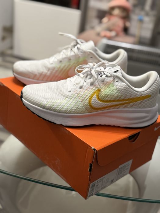 Маратонки Nike Run Defy