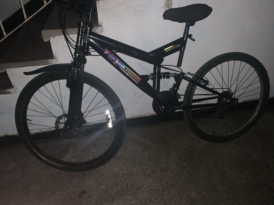 Vând bicicletă full suspensie