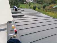 Montaj tigla metalica, sisteme pluviale, reparatii acoperisuri