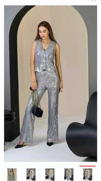 Продам красивый серебряный костюм с пайетками сорок шестого размера