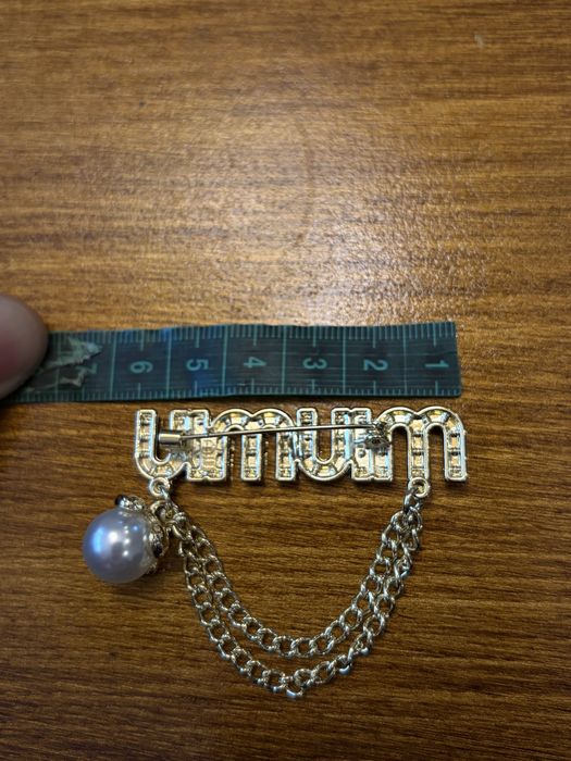 Brosa inscriptionata