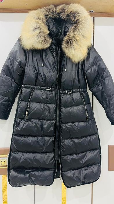 Пуховик женская.