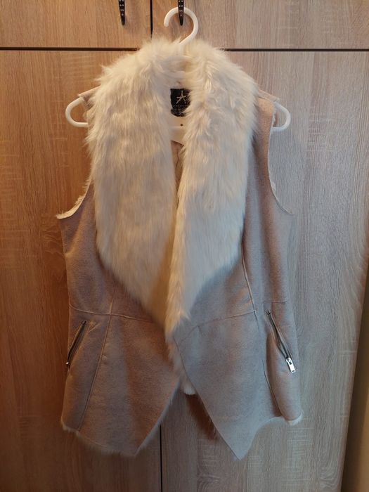 Vesta cu blanita