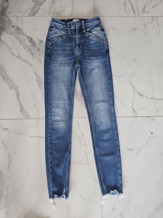 De vânzare blugi River Island