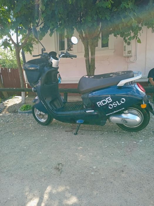 Schimb scuter electric cu mașina