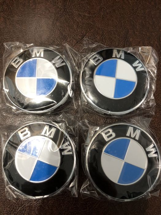 Set 4 capace roti, jante aliaj BMW Originale diametru 68 mm NOI