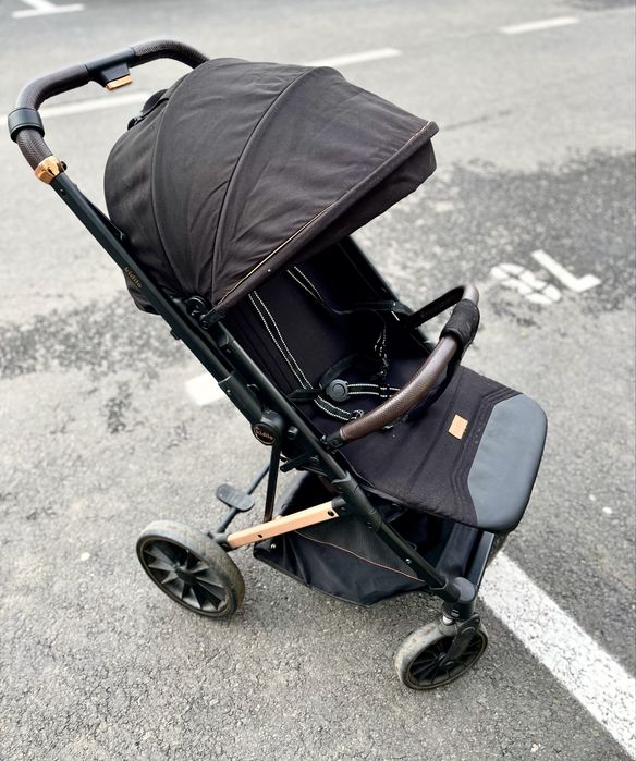 Carucior cu maner reversibil