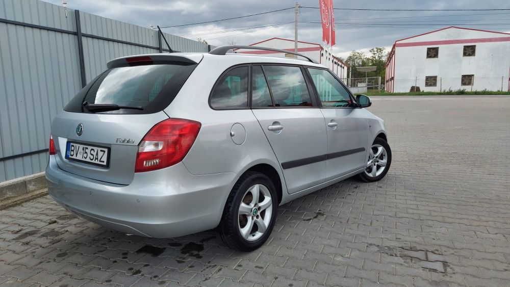 Skoda Fabia 1.6TDI-2012-EDITIE FAMILY-Senzori parcare-Climatronic etc.