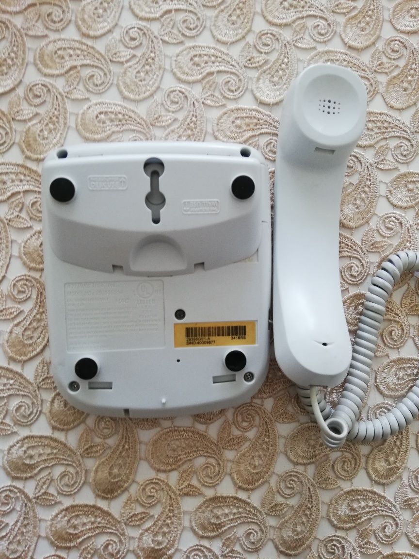 Стационарен телефон с възможност за закачане на стена