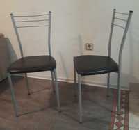 Сиви метални столове , тапицирани с черна кожа