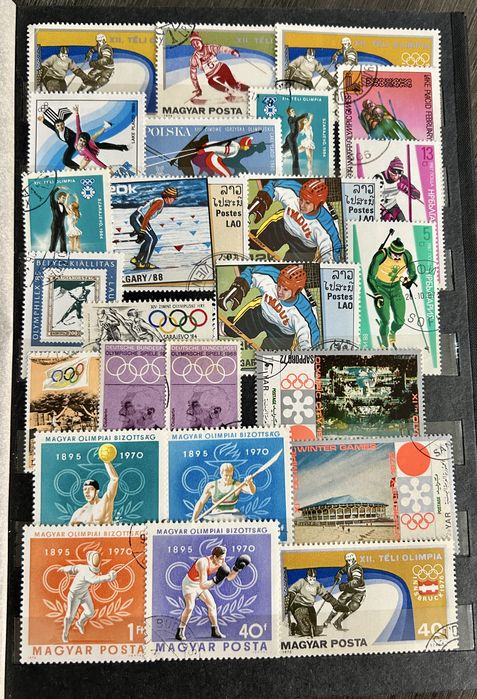 JG111. Класьор с 640 пощенски марки на тема  “ Спорт “