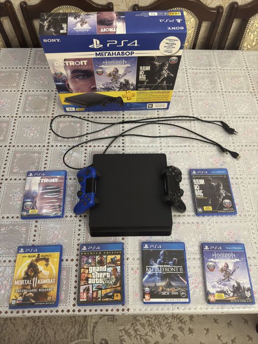 Продам PlayStation 4 Slim 1TB + 2 джойстика + 6 топовых игр